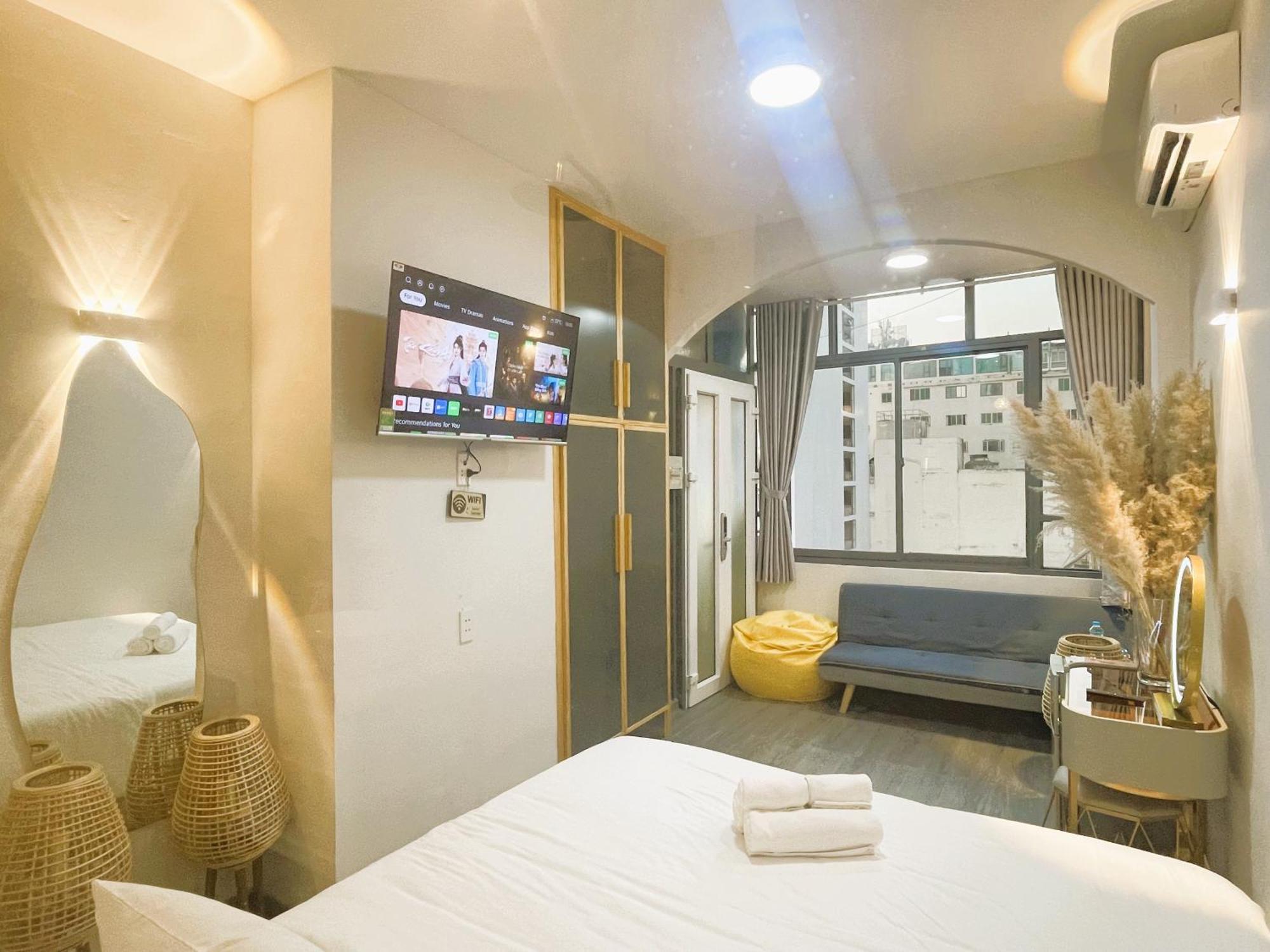 6Even Hotel - Have A Staycation In The Cafe Apartments Building Ho Şi Min Dış mekan fotoğraf